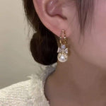 Golden and White Pearl Bow Tie Dangling Korean Fashion Earring